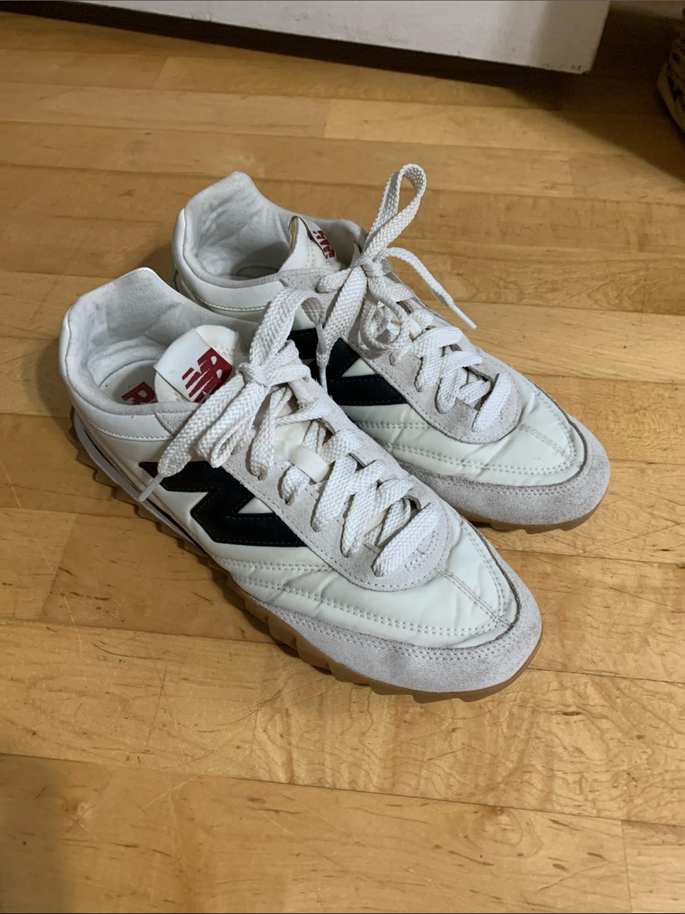 New Balance women’s White and Black Retro Trainer Sneakers
